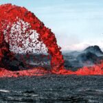 Arching fountain of lava approximately 10 m high issuing from the western end of the 0740 vents, a series of spatter cones 170 m long, south of Pu‘u Kahaualea.